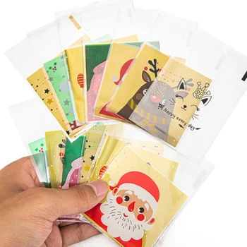 100 50pcs Opp Táskák a Karácsonyi Mikulás Ajándék Táskák Visszazárható Egyéni Tömítő Candy Tok Hópehely Elk Jelen Csomagolás Zsák Csomagolás